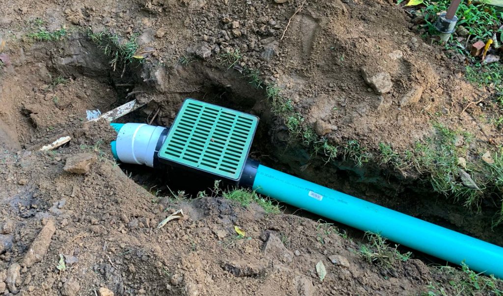 Storm Water Dispersal Tool In The Dirt Set Up