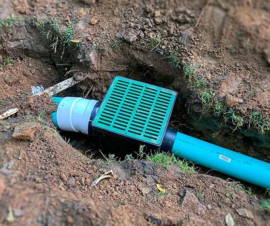 Storm Water Dispersal Tool In The Dirt Set Up