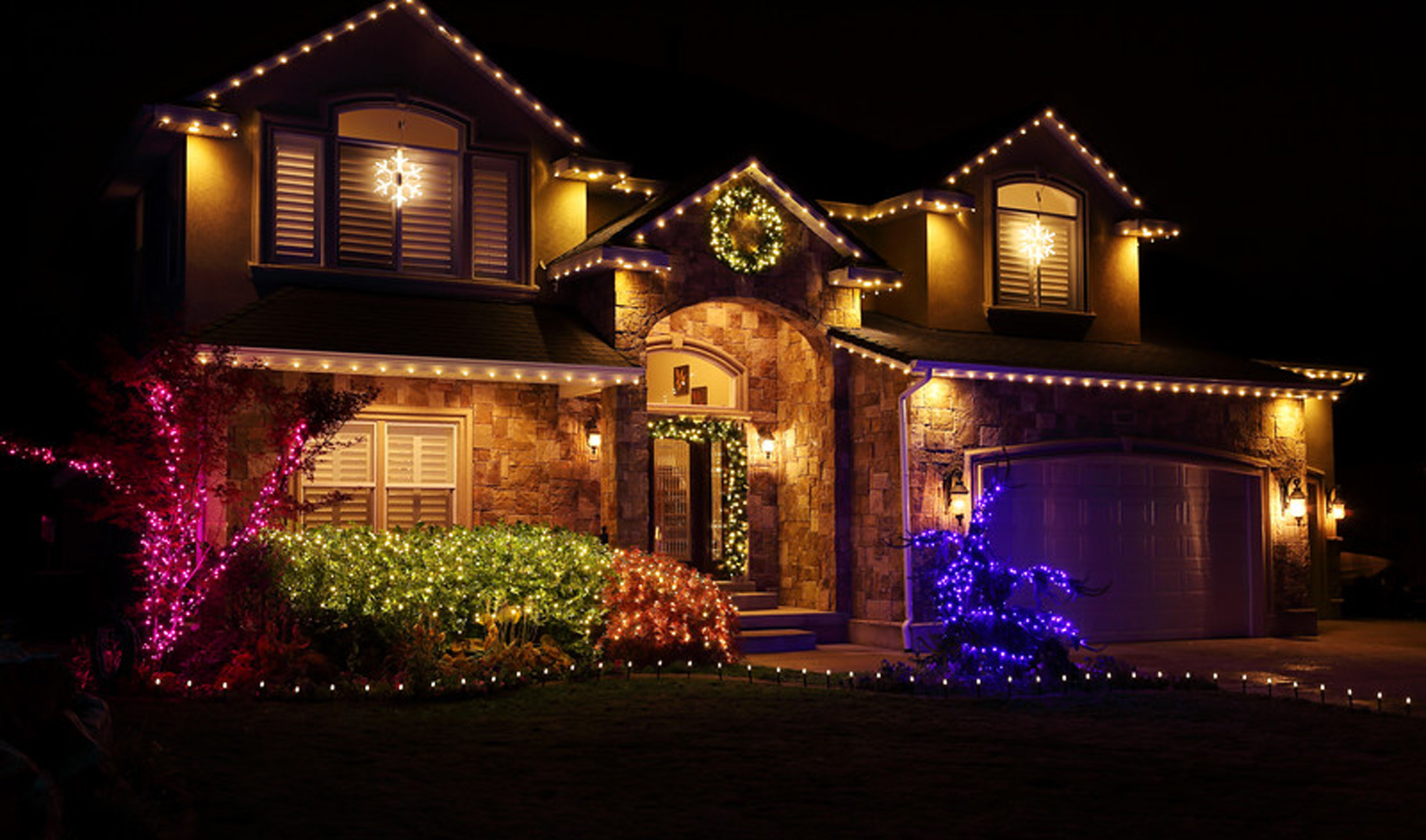 Home Lined with Large Bulb Holiday Lights