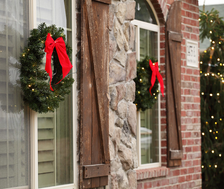 Wreath on Front of Home With Brick Exterior