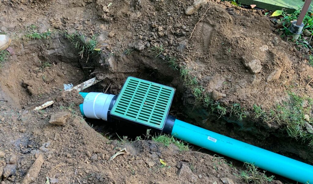 Storm Water Dispersal Tool In The Dirt Set Up